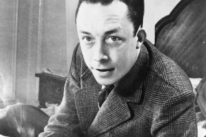 Albert Camus on Jan 1st 1957, holding a cigarette