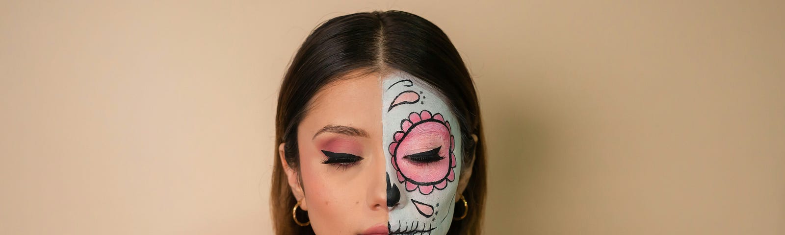 Woman with half painted skeleton face