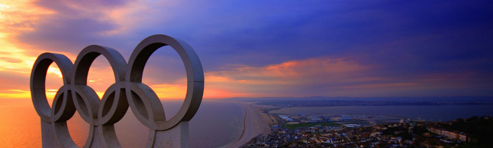 Scenic view of Olympic rings overlooking the sunset