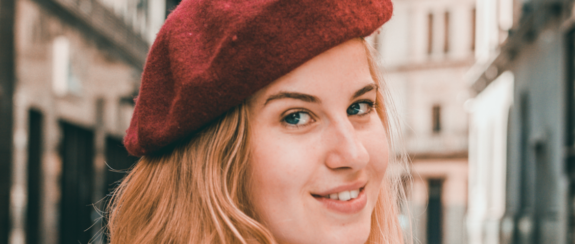 Portrait of a woman wearing a red beret
