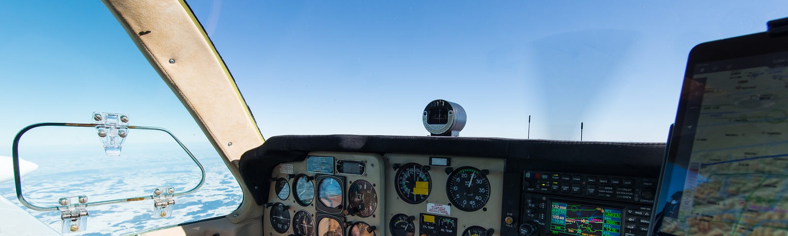 Pilot in cockpit.