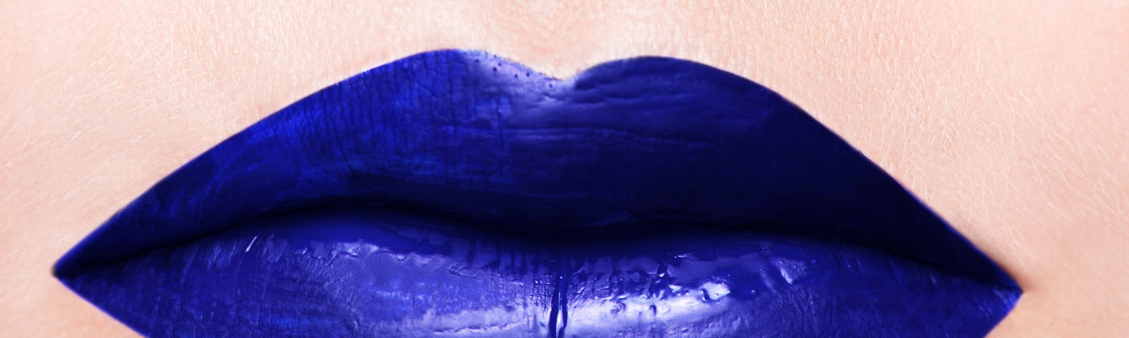 A woman with blue lipstick on her pouting mouth. (erotic fiction, erotica, flash fiction, oral sex, blow job, sex, fiction)