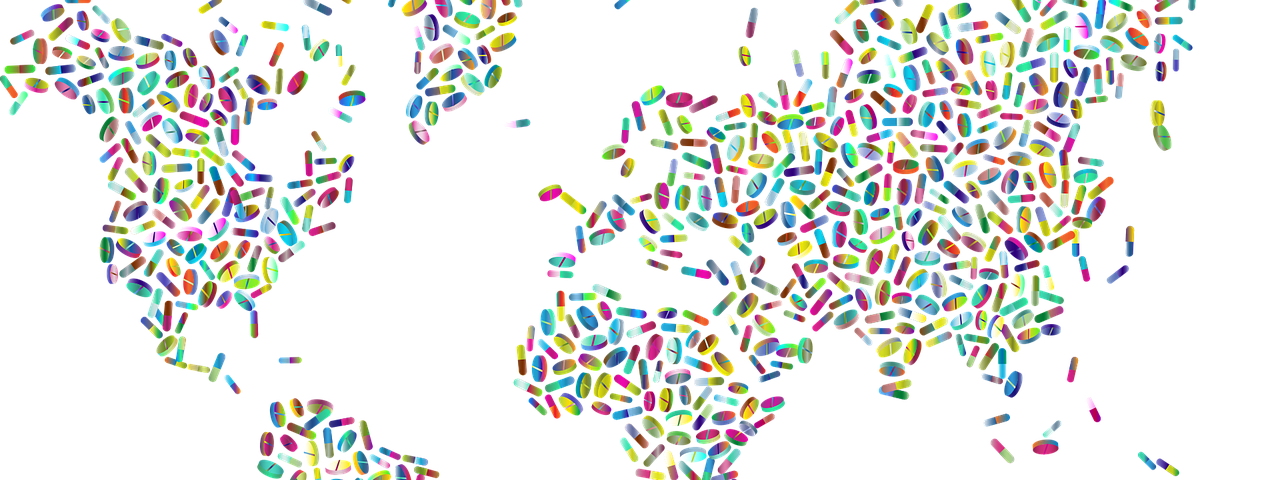 A map of the world created using different coloured pills of various shapes and sizes.