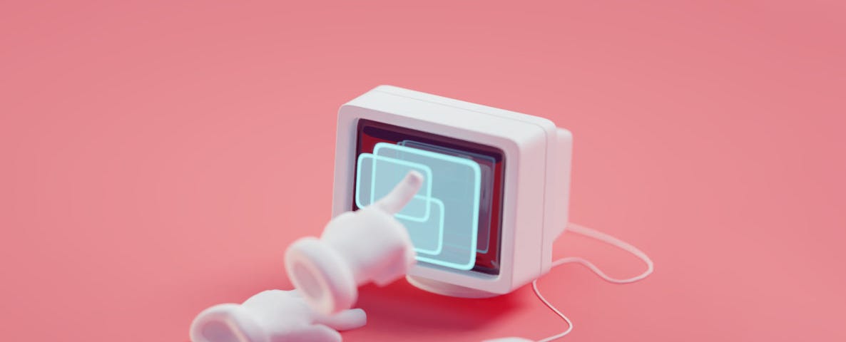 White gloves pointing at an old CRT monitor with a pink background