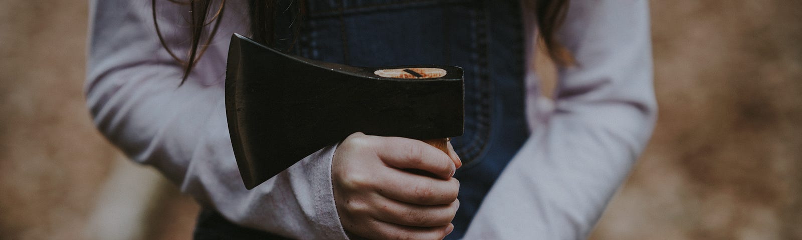 Girl holding an axe