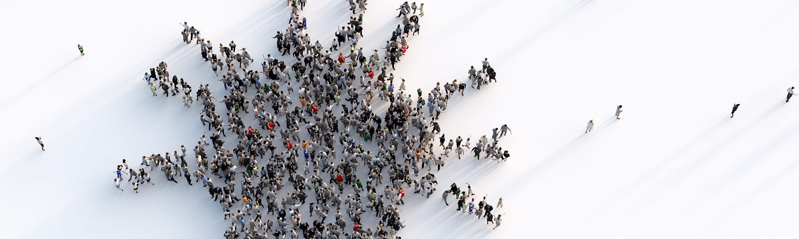 People forming the shape of the COVID-19 virus. Photo by NiseriN\Getty Images