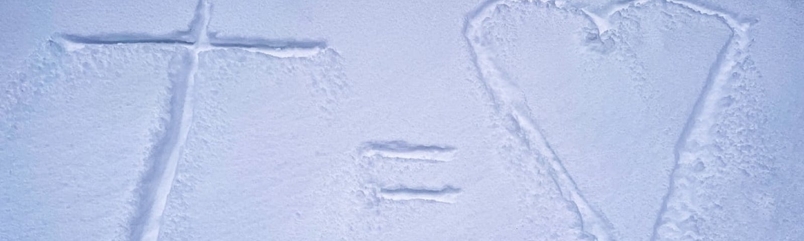 A photo of snow marked out with a cross equaling love.