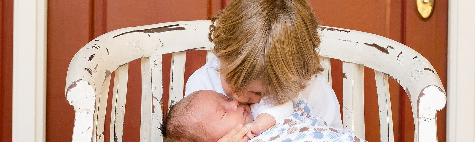 Baby and toddler in love.