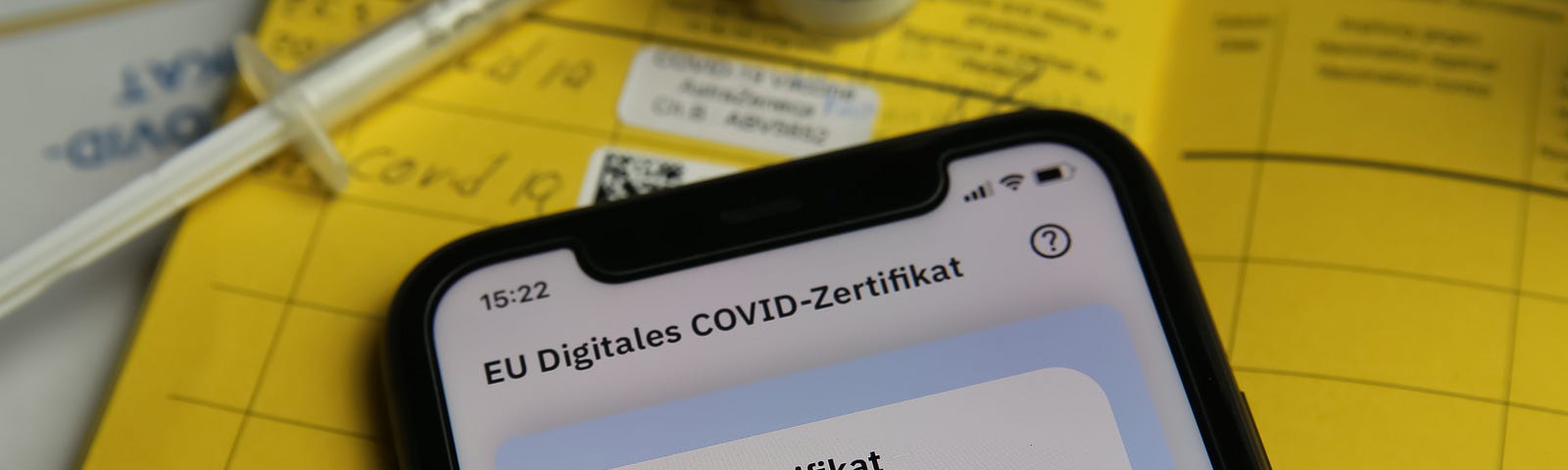 Closeup of mobile phone screen with qr code of digital COVID-19 vaccination certificate Covpass app