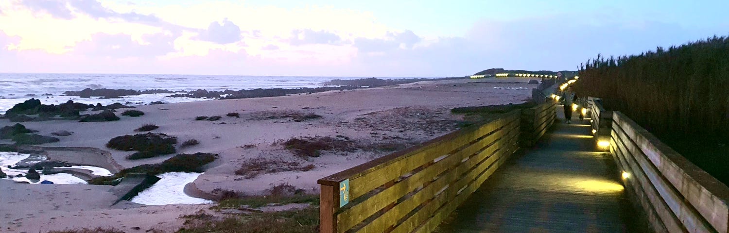 evening walk on beach boardwalk