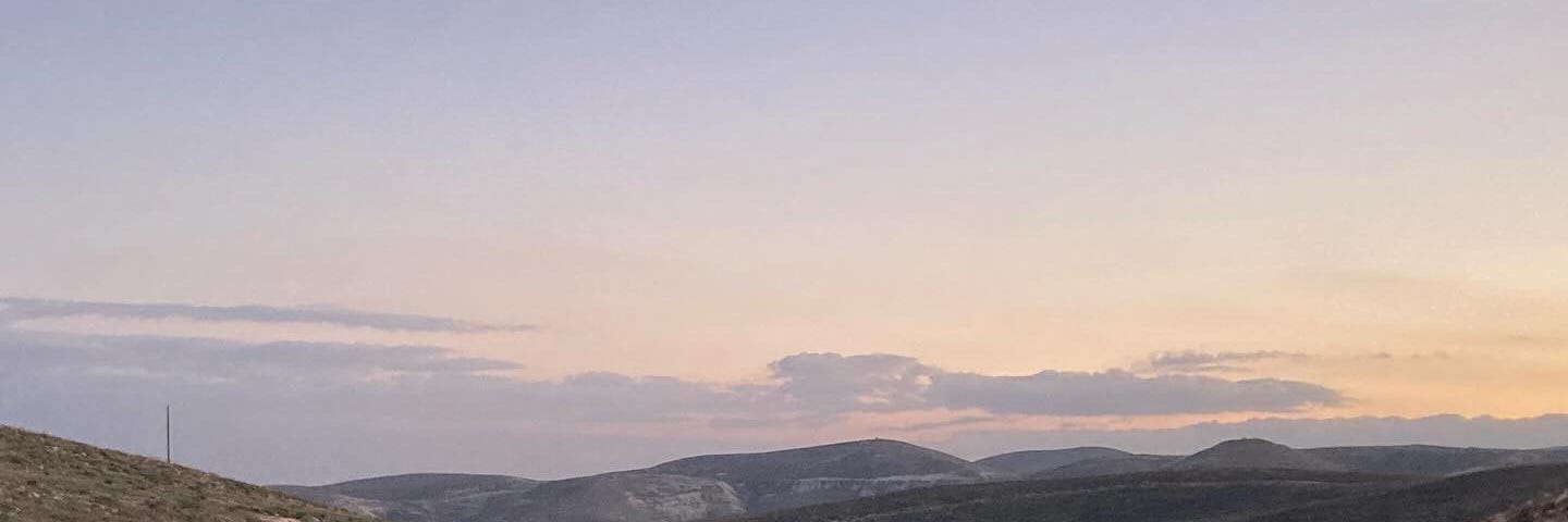 Hilltops and skyline at sunset