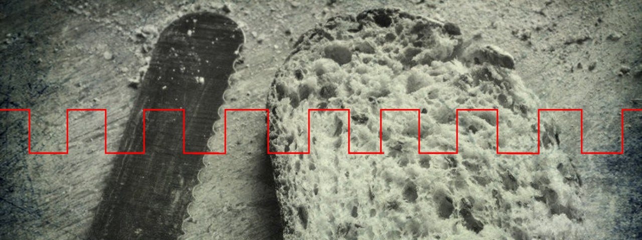 Black and white photo of a bread knife and a piece of cut bread with a red square-tooth wave running across the image