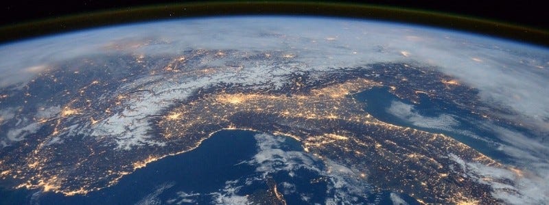 An image of the earth and its continents geography at night.