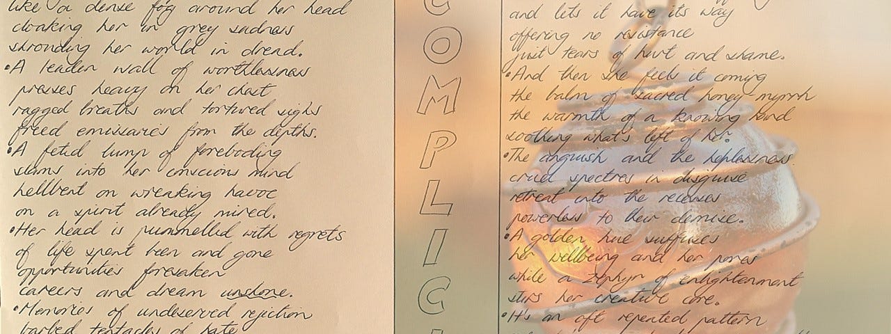 A handwritten poem entitled, Complicit, on a multi-colored background with an ornamental glass orb encased in copper coil.