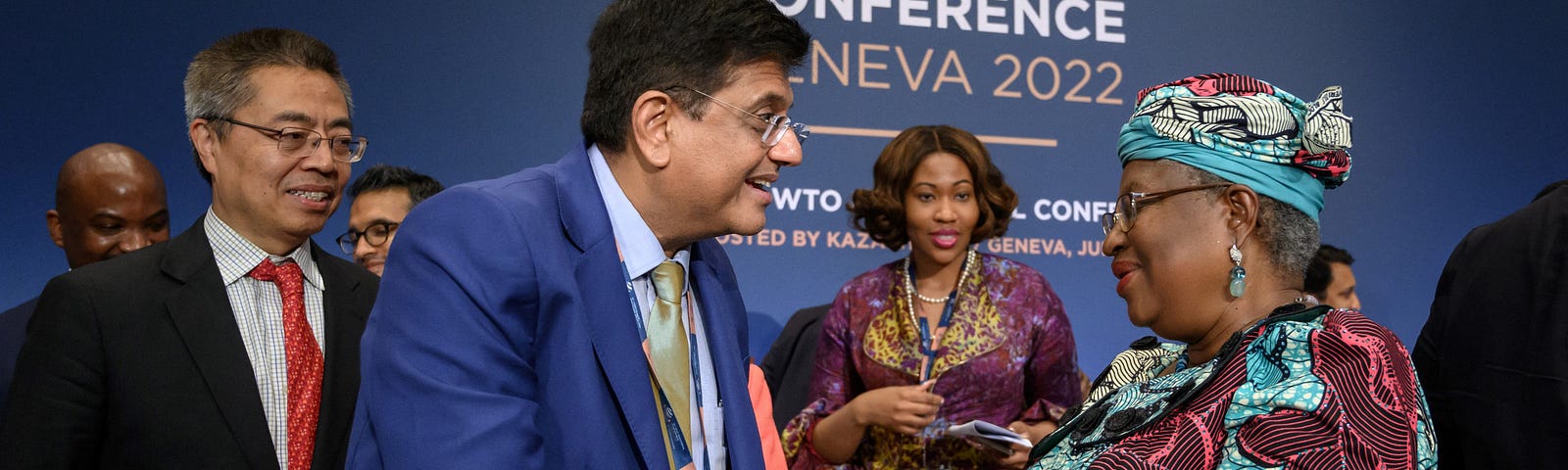 WTO Director-General Ngozi Okonjo-Iweala is congratulated by Indian Minister of Commerce Piyush Goyal at the 2022 World Trade Organization Ministerial Conference.