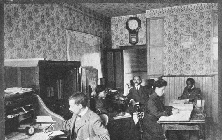 Photograph of 5 employees from an office in Virginia in 1900