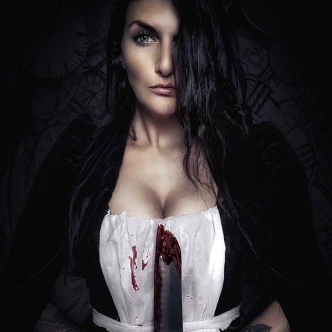 Woman, long dark hair, gothic, dark clothes, bloodstained knife, witch, occult