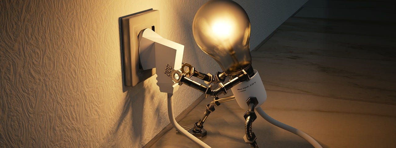A tiny robotic lightbulb plugging itself into a wall socket.