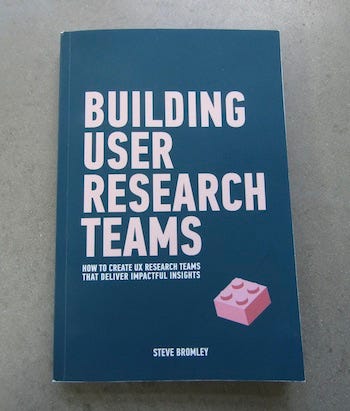 Photo of the book Building User Research Teams by Steve Bomley