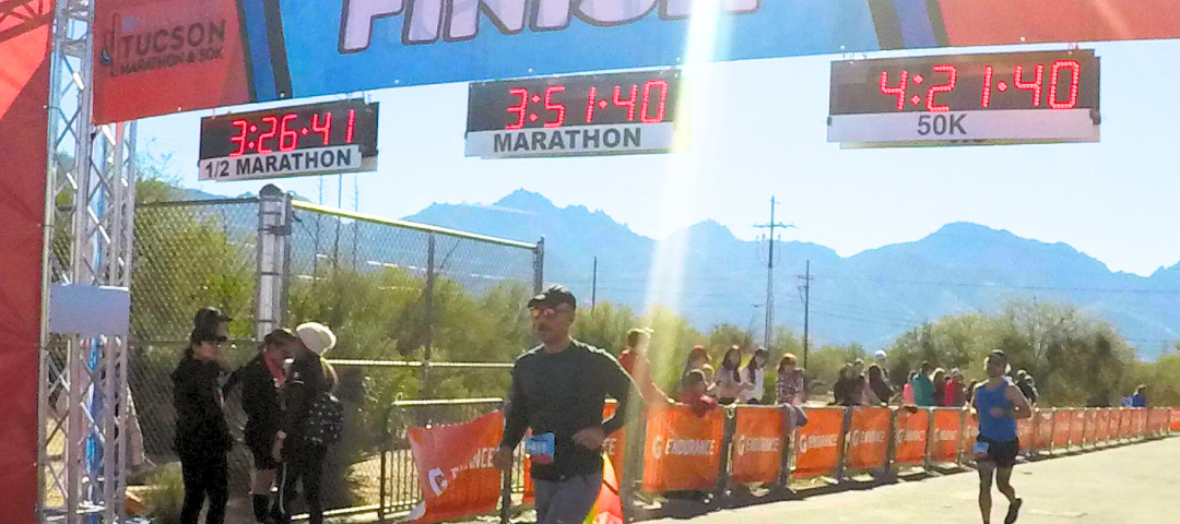 Joel completing the Tucson Marathon