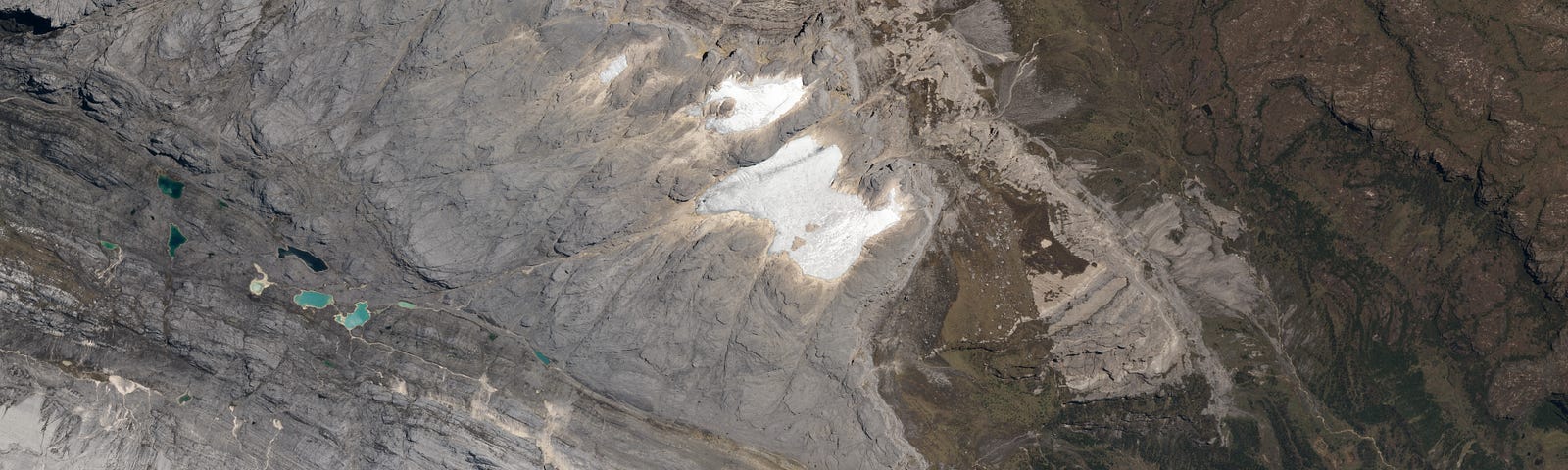 Satellite view of glaciers beneath the summit of Puncak Jaya, Indonesia.