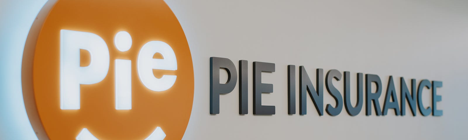 A photo of the Pie Insurance logo at its offices