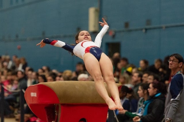 young gymnast on vault