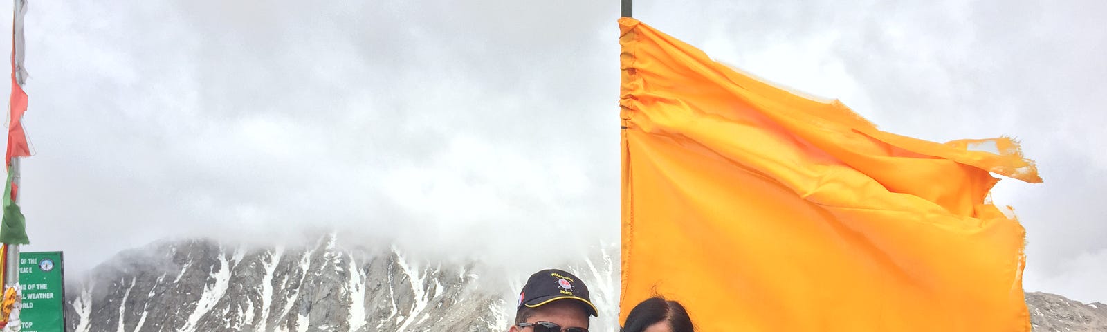 On top of the Khardungla Pass with my husband Shakti-Photo by Author