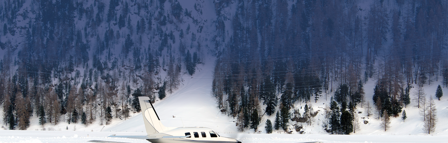 Photo of an airplane on a snowy taxiway.