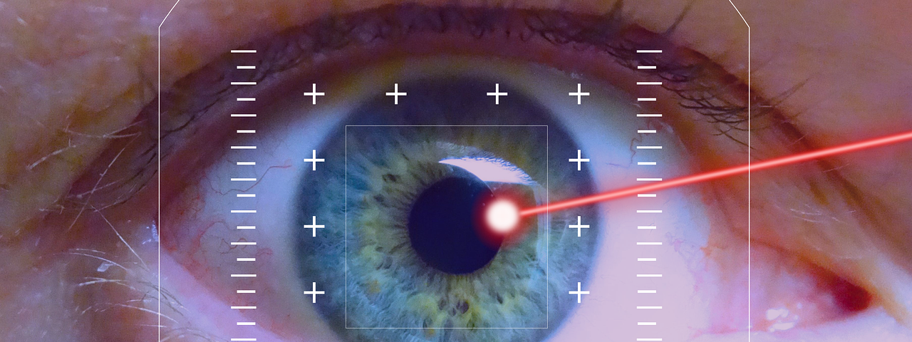 Laser surgery on a human eye.