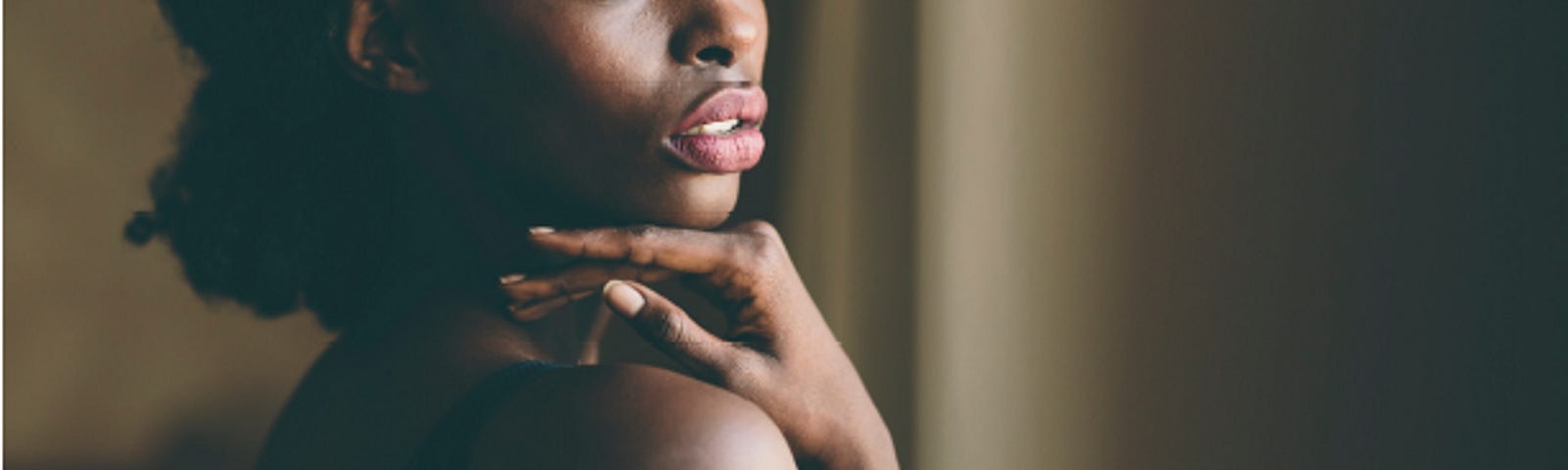 Photo of bare skinned black woman, for Maya Angelou Phenomenal Woman Medium story.