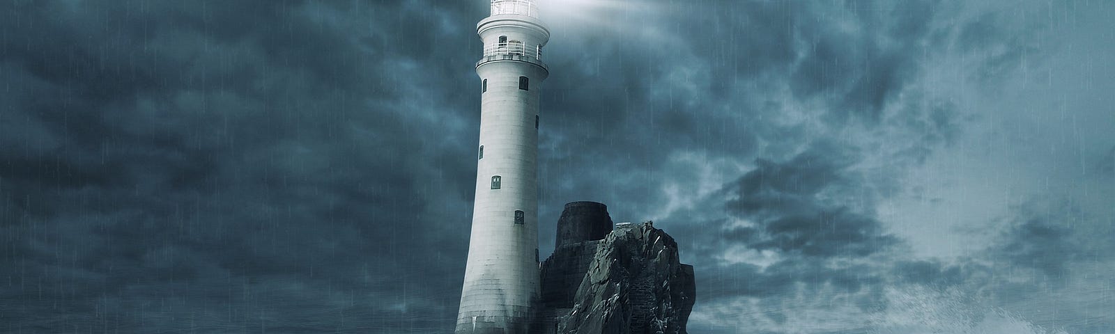 A lighthouse shines through the storm.