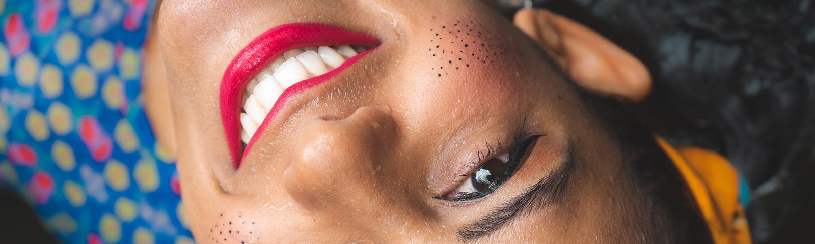 A happy woman with a twinkle in her eye, looking up