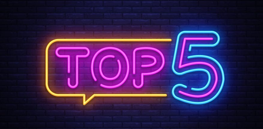 Neon sign of a speech bubble saying “Top 5”