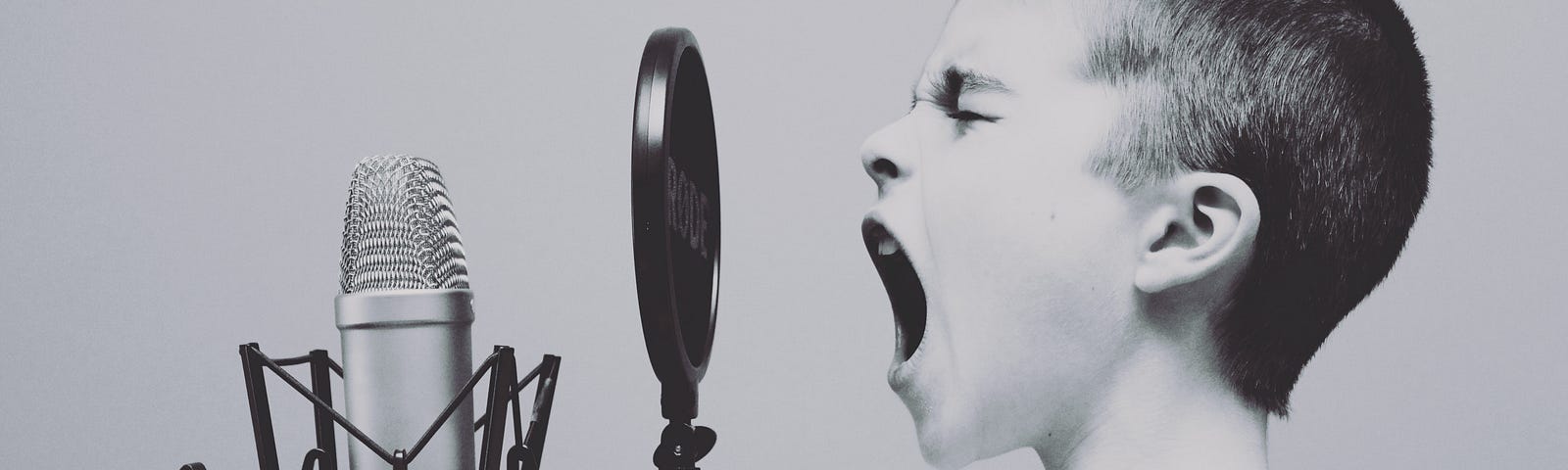 Photo of child yelling into microphone by J Rosewell posted on James Goydos MD article ‘comms is king’