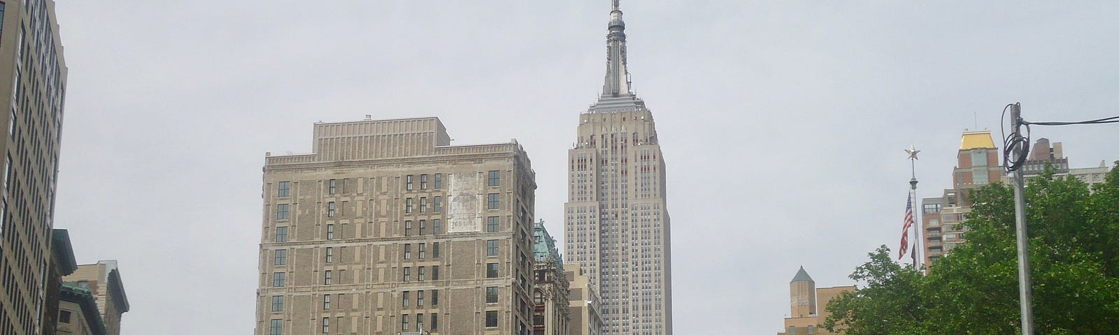 Empire State Building pictured from city streets of New York.