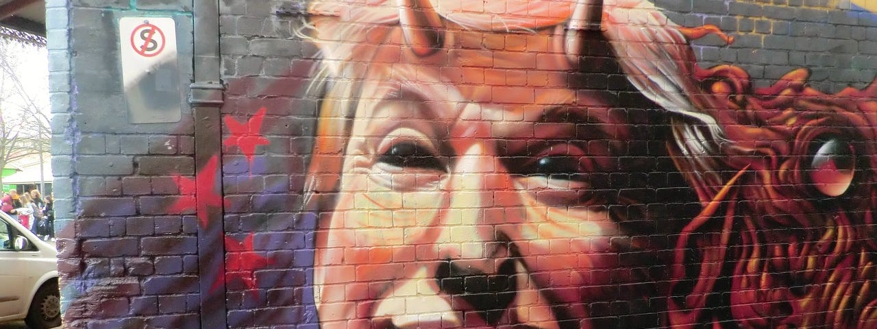 Graffiti mural depicting Donald Trump as the Devil