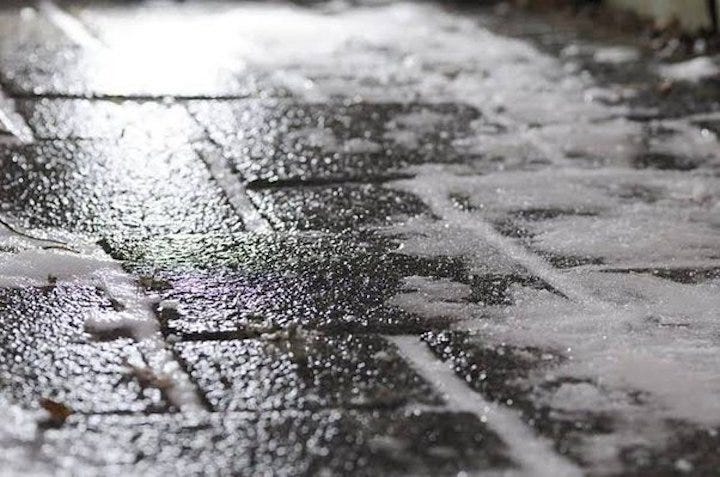 Photo of a patch of slippery black ice. Humor. Funny. Winter. Snow. Weather. Christmas. Santa. Health. Medical.