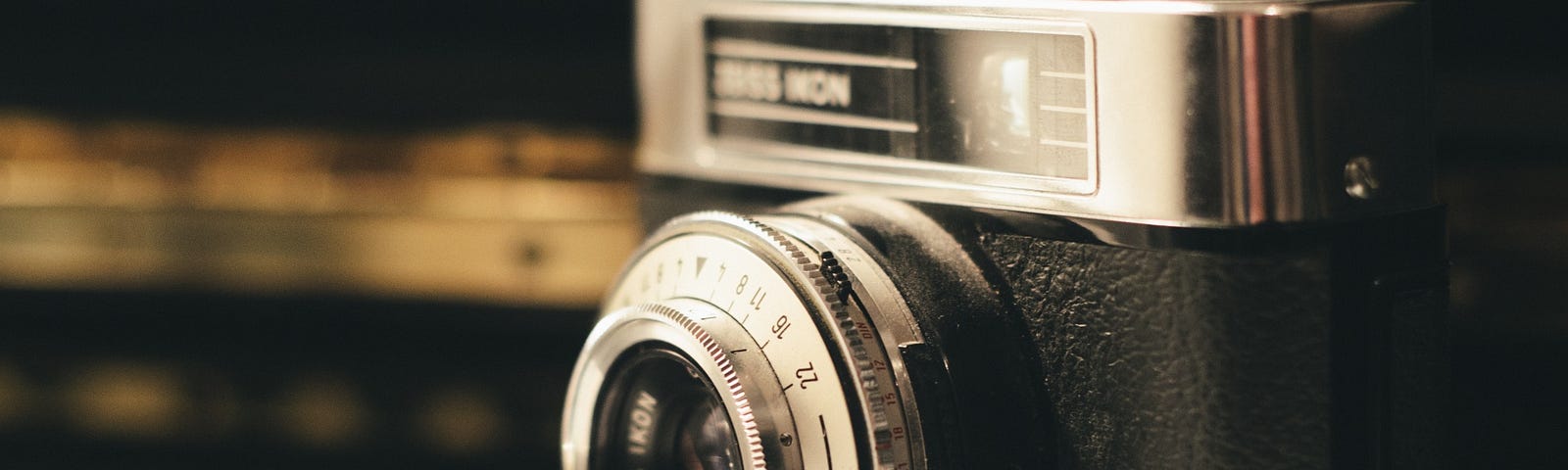 Camera sitting on top of piano keys.