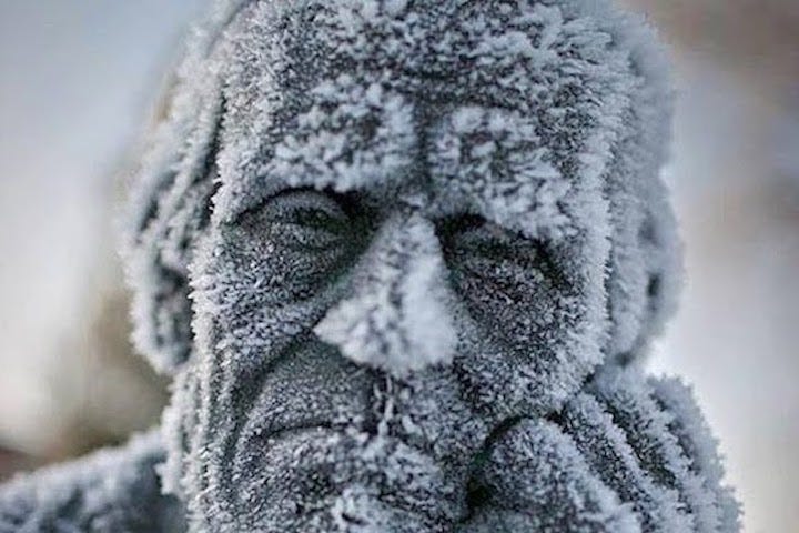 Photo of old man frozen stiff. Funny. Humor. Snow. Ice. Weather. Cold