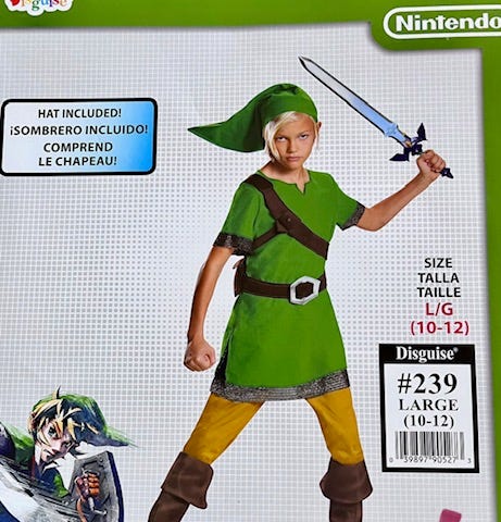 Legends of Zelda Link costume package front with image of kid wearing green tunic and elf hat along with mustard pants, and brown boots. The package bottom right corner says “Toy sword, pants, and boots not included.”