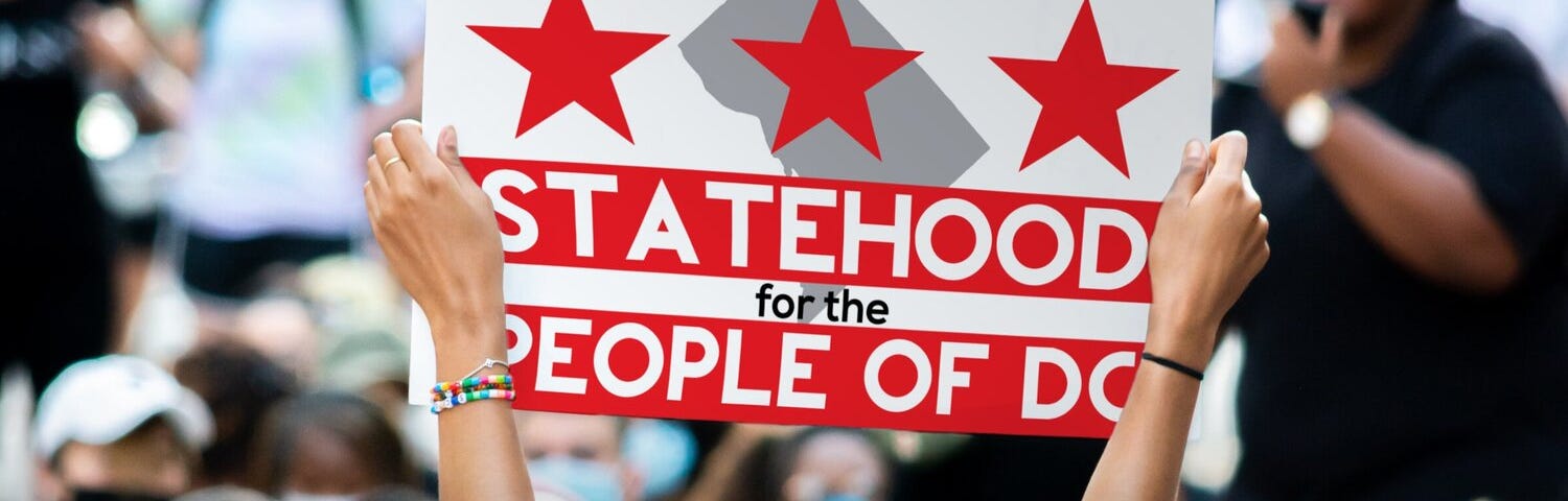 Statehood for the People of D.C. sign at a protest.