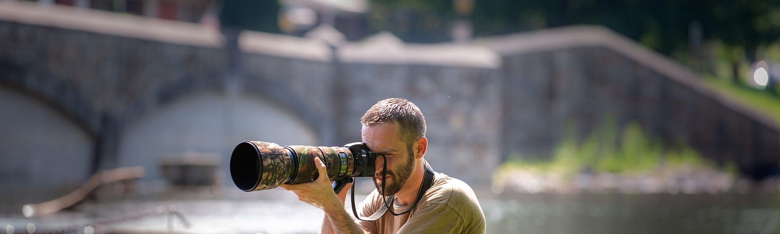 Grayson Smith wildlife photographer doing what he does best in Baker Park Frederick, Maryland.