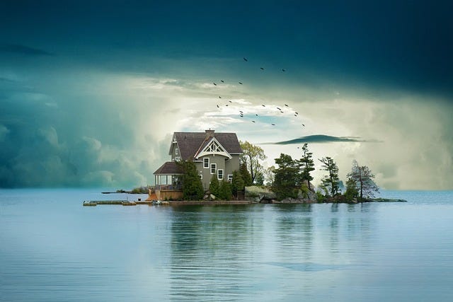 House, home on an island, surrounded by water, trees on the island, birds above, blue sky with clouds