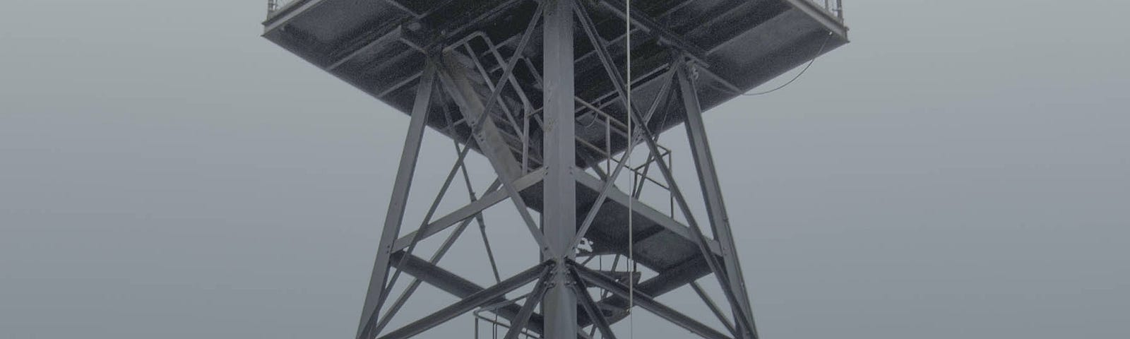 Lonely observation tower on a gray day.