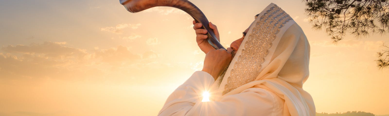 A Jewish man blowing the Shofar (ram’s horn), which is used to blow sounds on Rosh HaShana (the Jewish New Year) and Yom Kippur (day of Atonement)