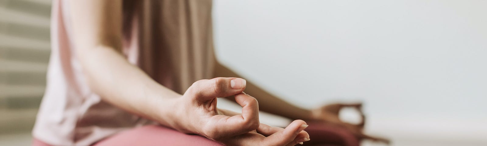 A woman sitting in meditation