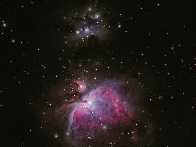 A purple nebula in space