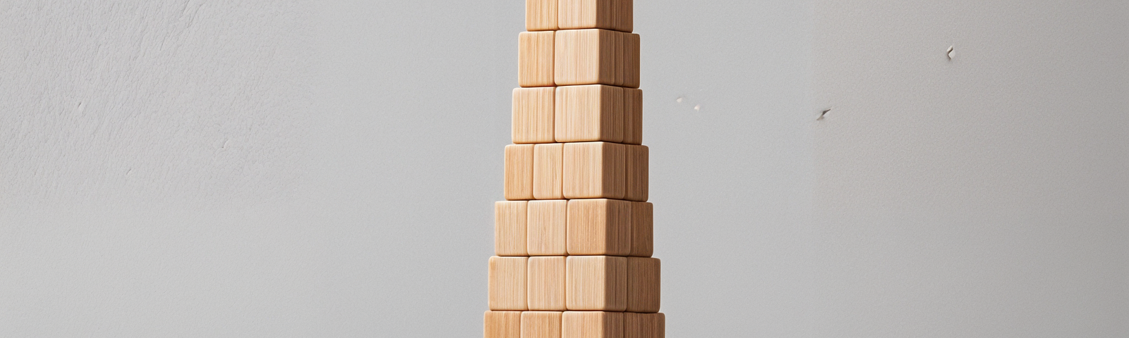 To make a pile of code blocks represent a tower, you have to adapt some pieces. Generated by AI