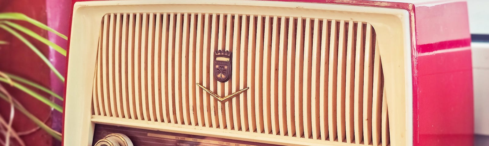 A vintage radio on a windowsill